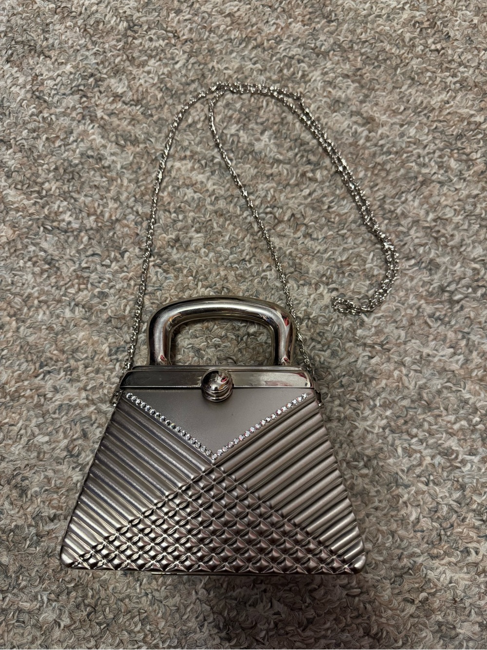 Silver tone metal mini evening bag with chain strap